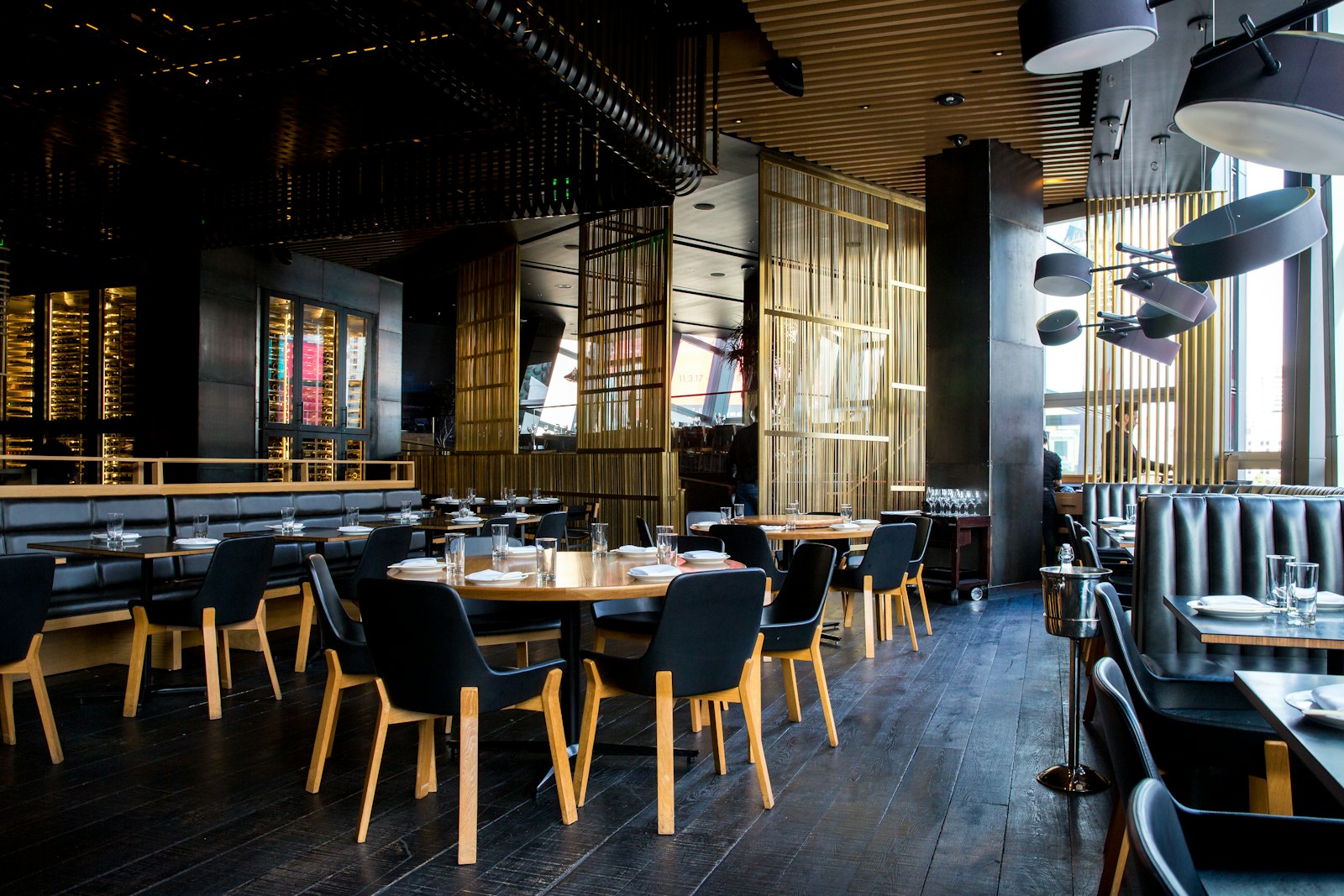 Dark industrial steakhouse dining room